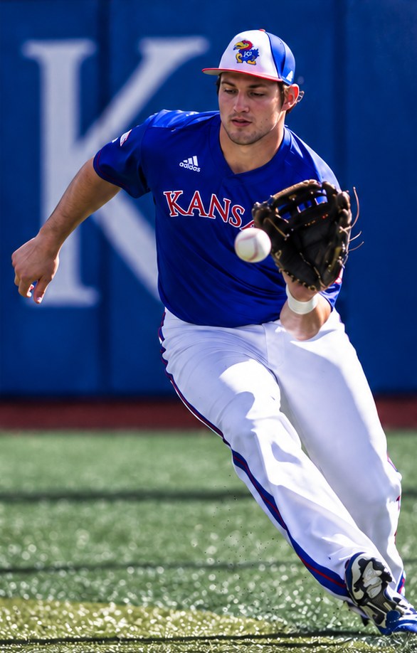 Dakota Smith fielding a ground ball for the University of Kansas